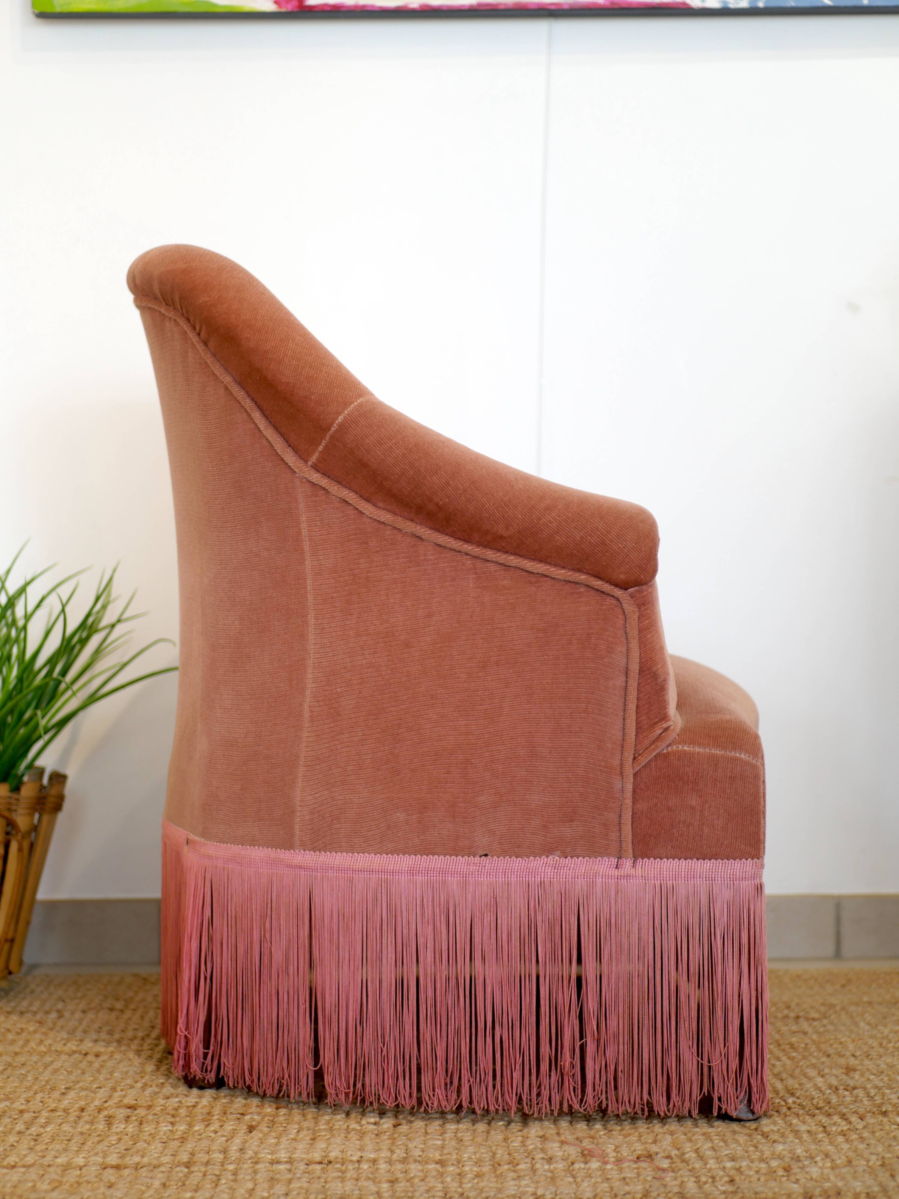 Pink velvet armchair