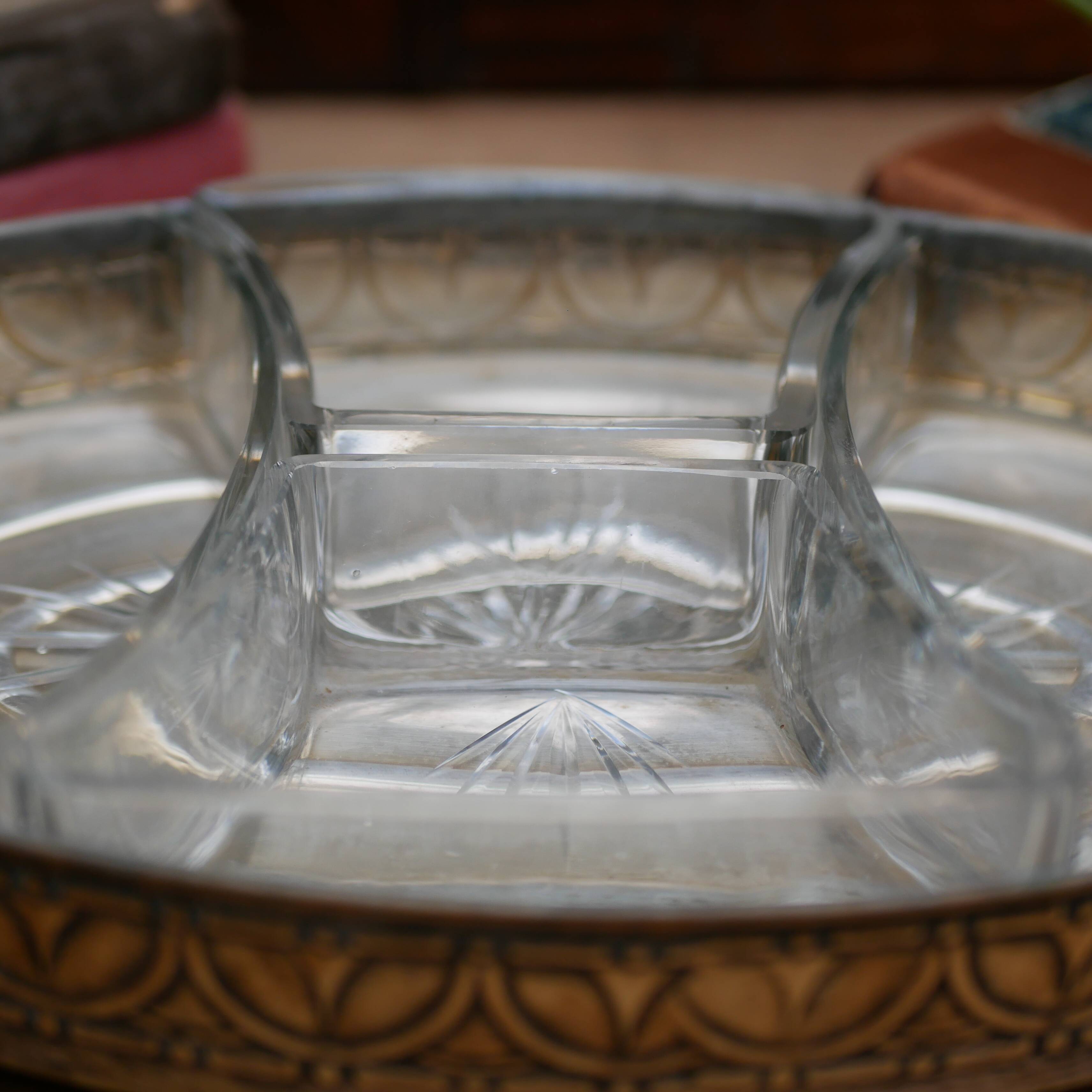 Art Nouveau serving dish plated in copper with removable glass inserts.