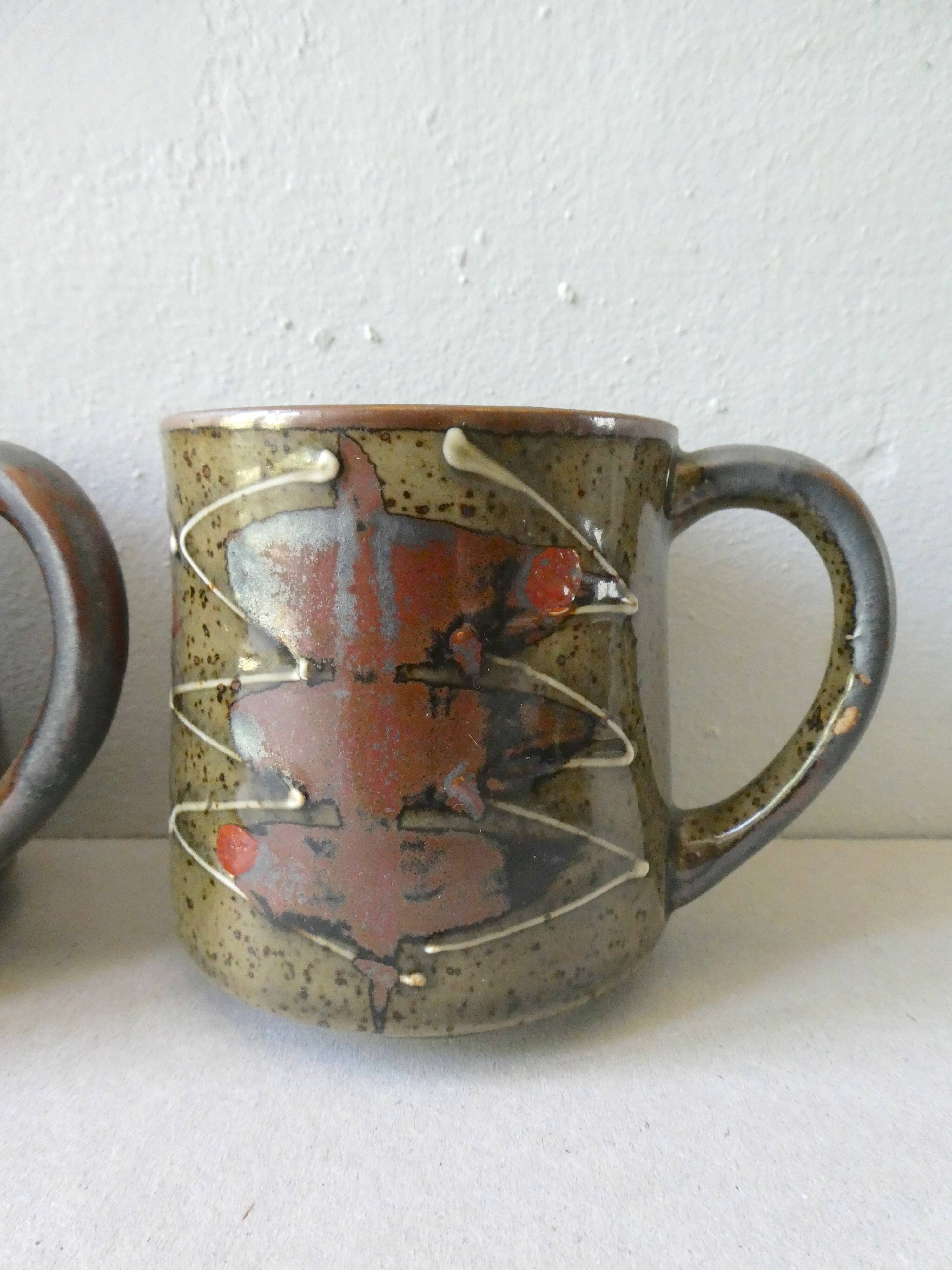 Set of 4  sandstone mugs 70 years