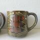 Set of 4  sandstone mugs 70 years