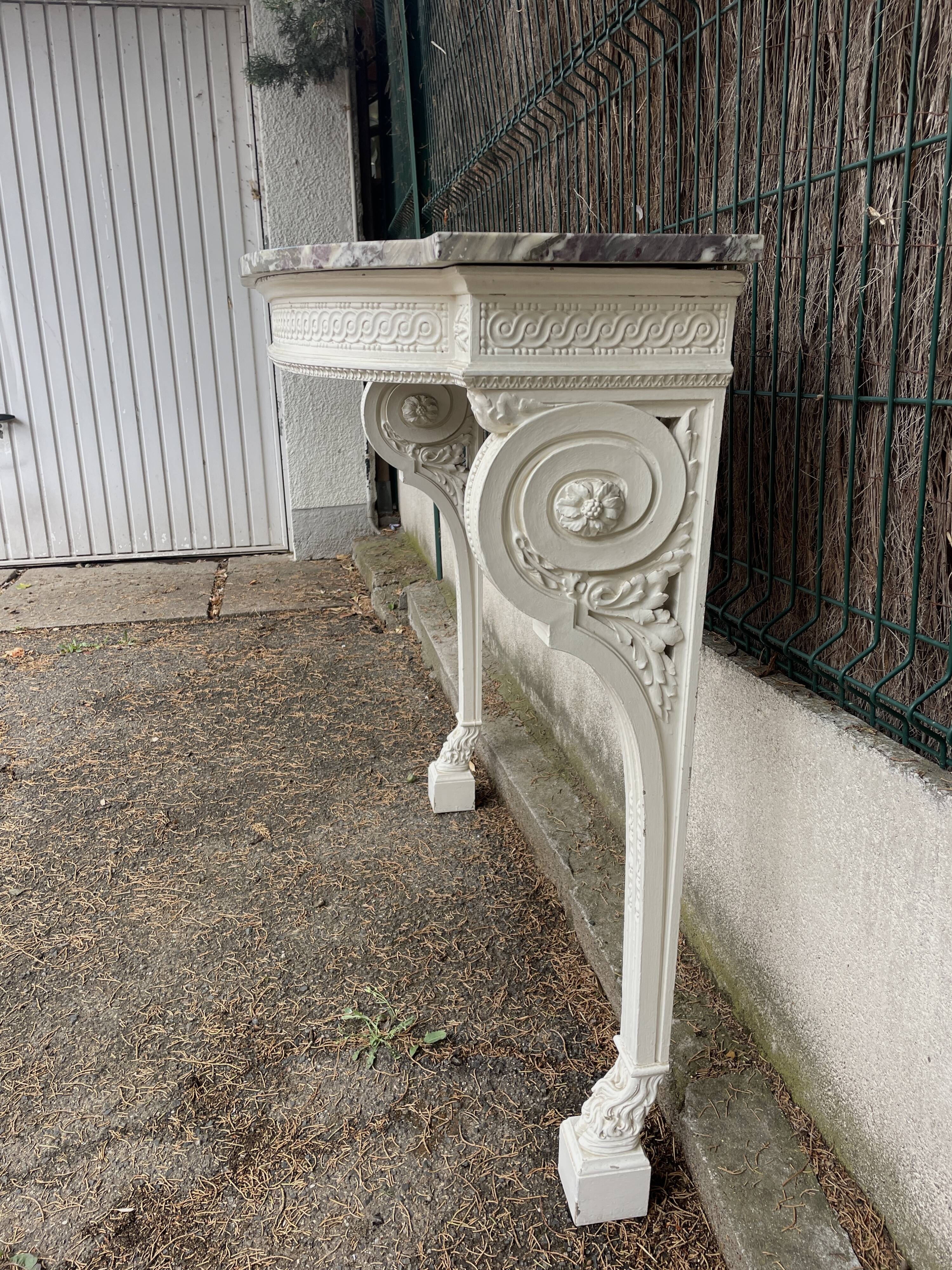Painted wooden wall console with doe legs and interlacing. Louis XVI. Peach blossom marble