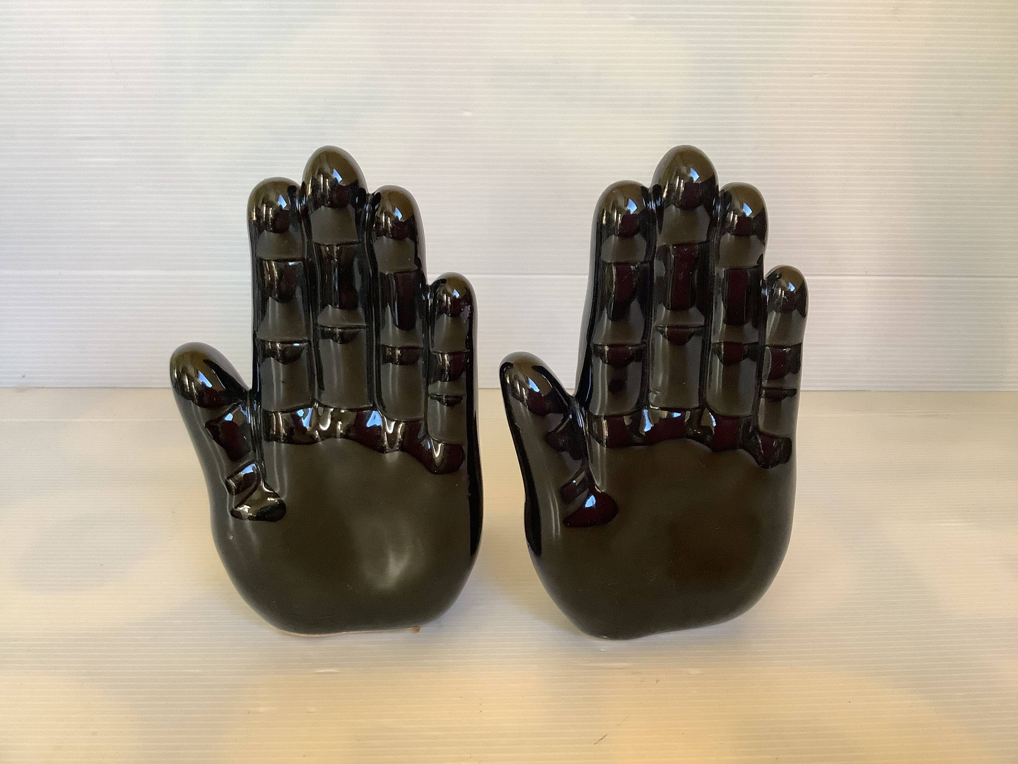 Pair of black hand bookends