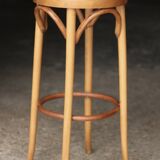 Beautiful caned stool in curved blond wood. 1940s/1950s