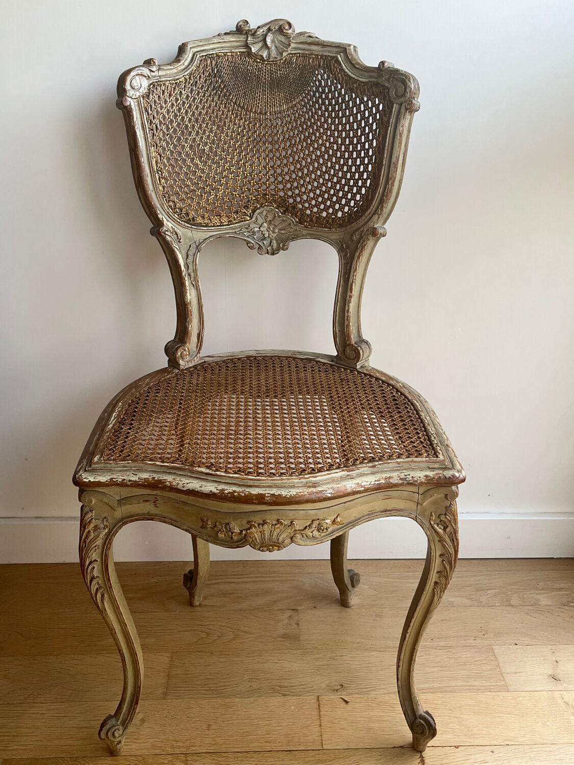 2 caned chairs in Louis XV Regency style