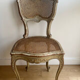 2 caned chairs in Louis XV Regency style