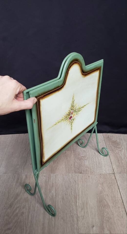 Vintage magazine rack in painted sheet metal
