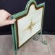 Vintage magazine rack in painted sheet metal