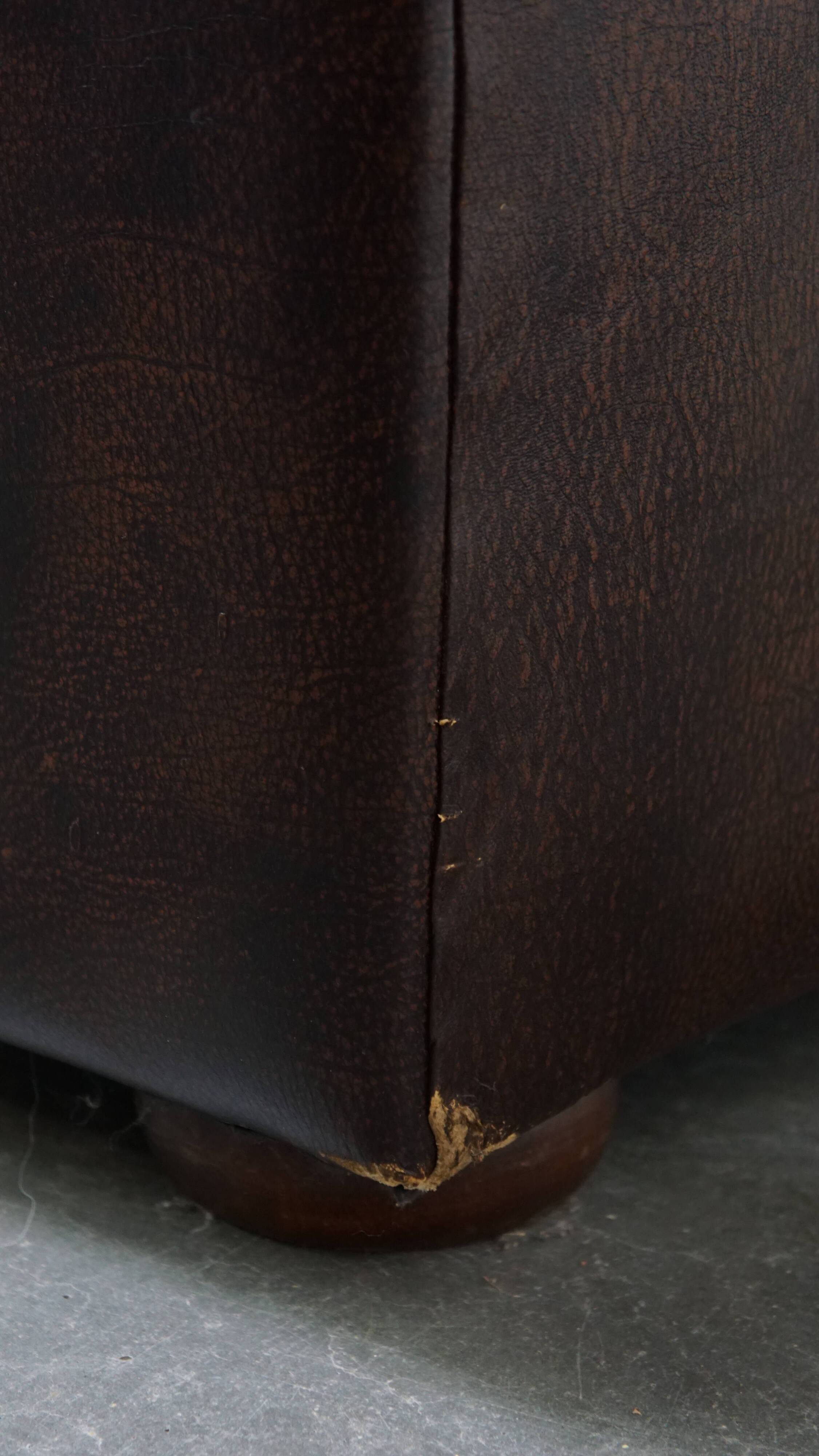 Dark brown English cowhide leather chesterfield armchair