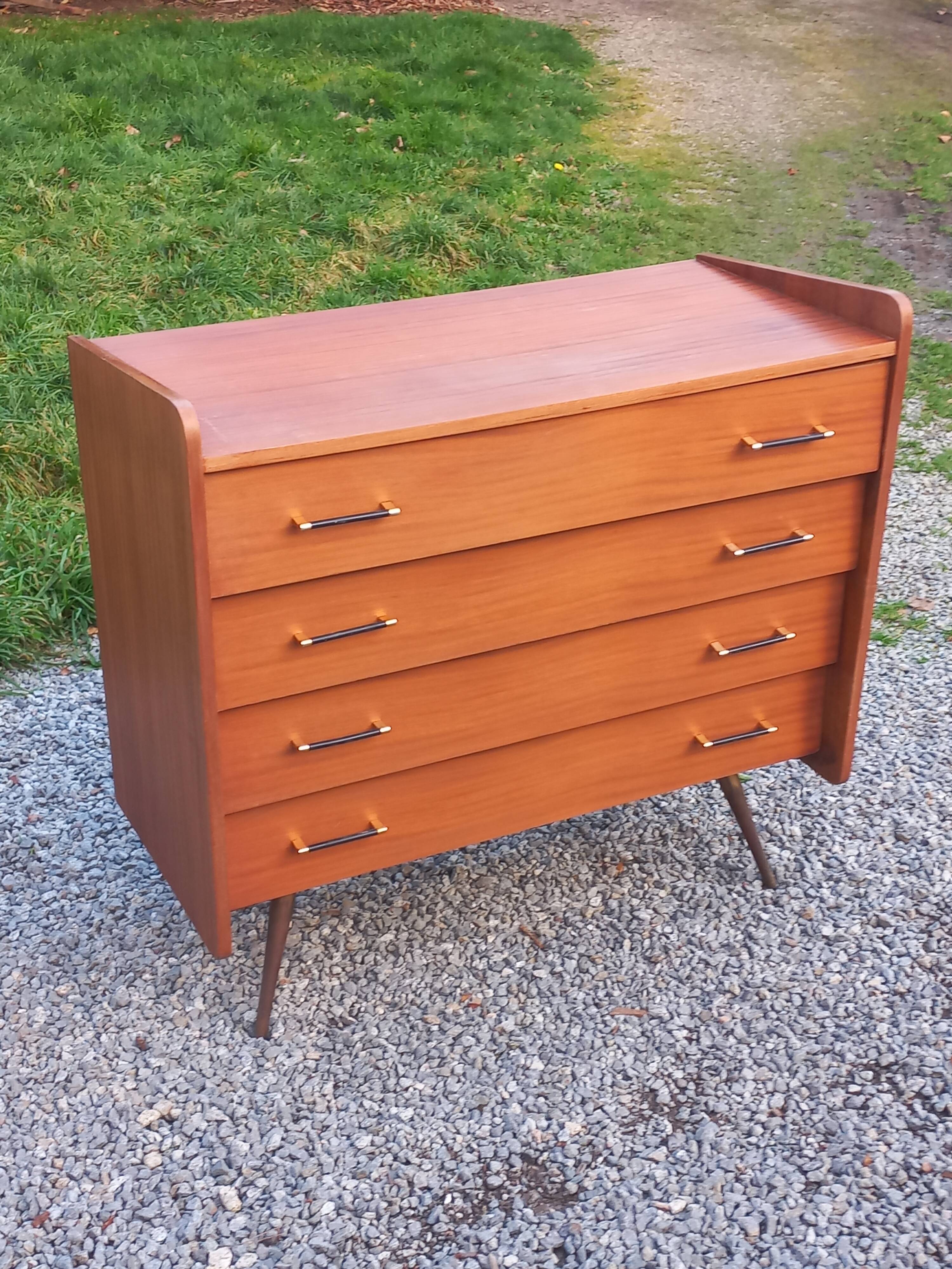 Vintage mahogany commode with metal tapered legs, 4 drawers, 1950s.