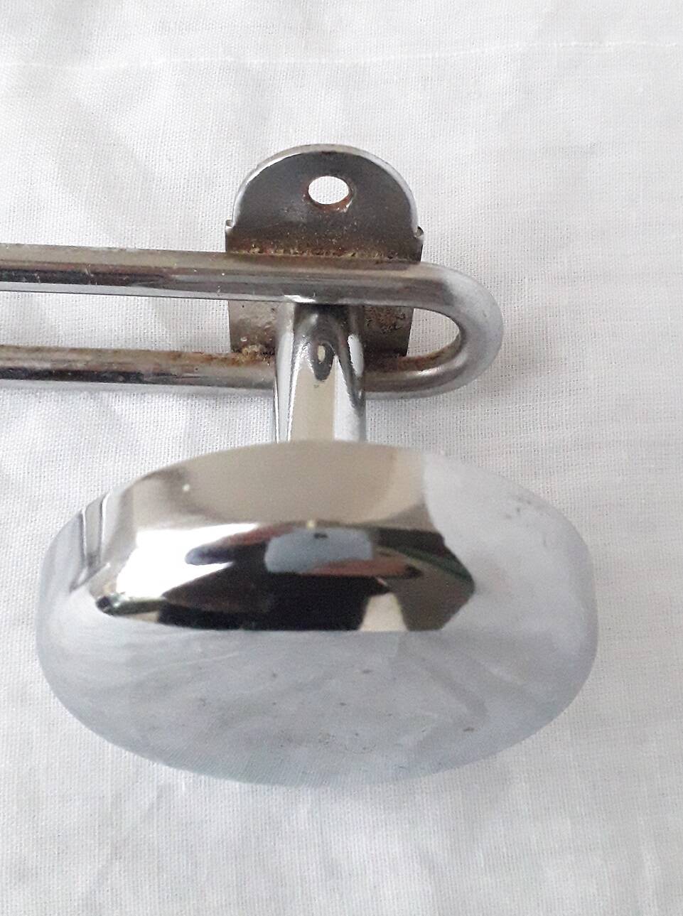 Chrome metal wall coat rack