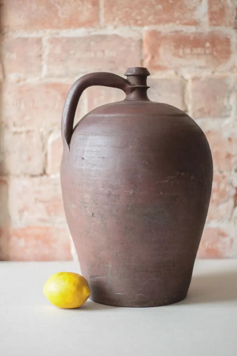 Old handled pot, antique pot, handled jar, interior decoration, collection, pottery.