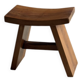 Small stool with a curved seat in Asian teak H36 W21