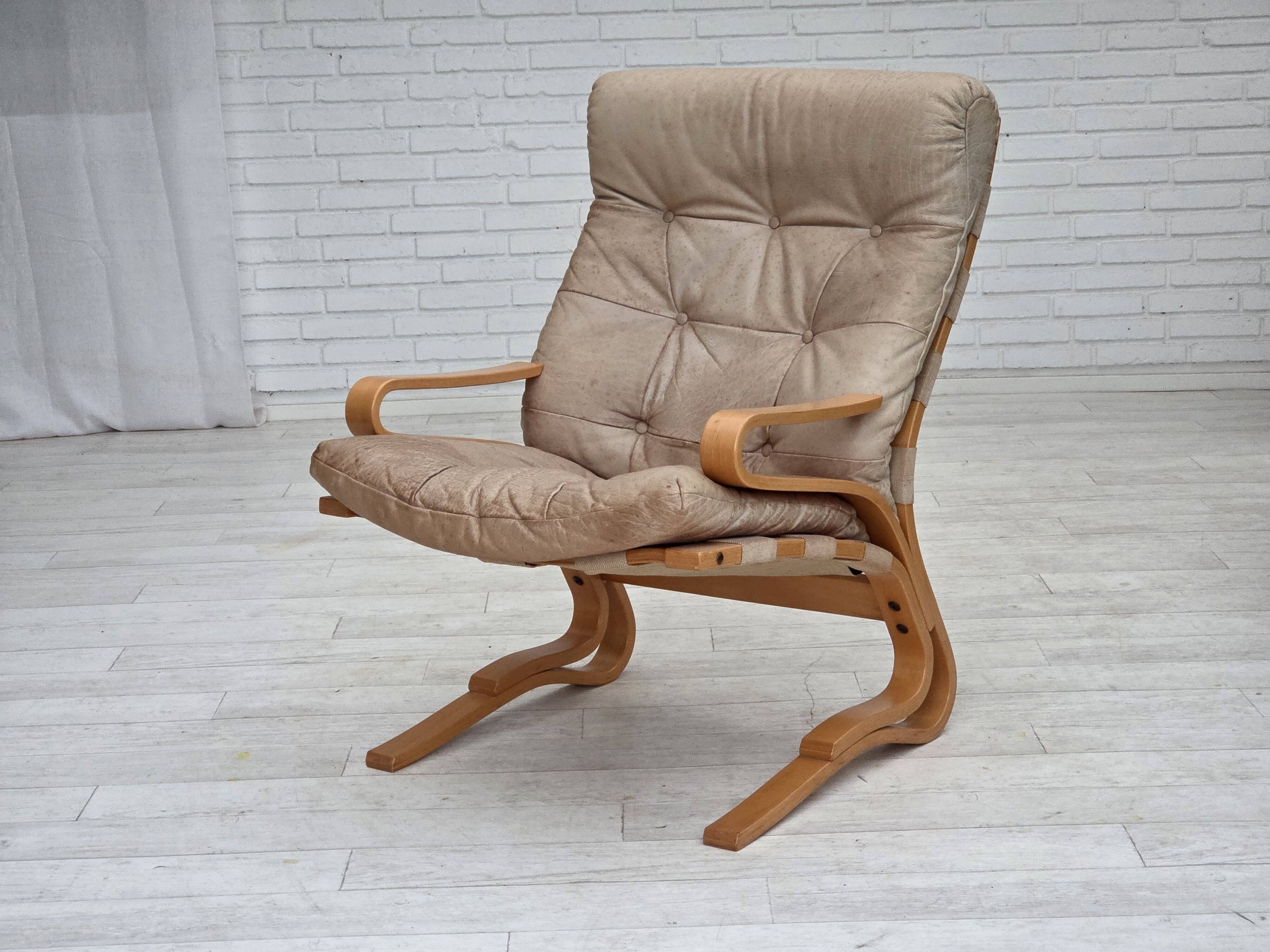 1970s, Norwegian armchair, model "Kengu", beige furniture leather.