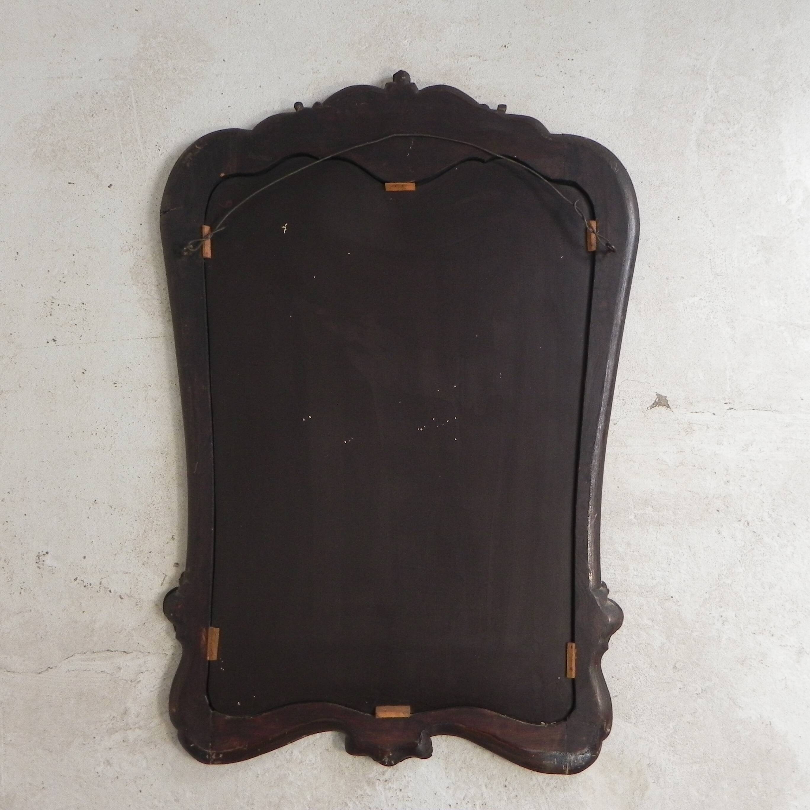 Romantic mirror with faceted glass in a walnut frame, 1942