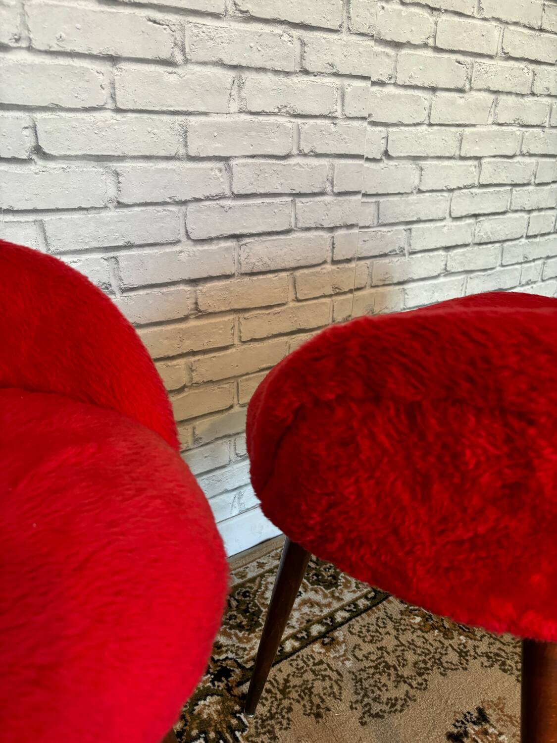 Two vintage 60s/70s armchairs in red moumoute, pelfran style