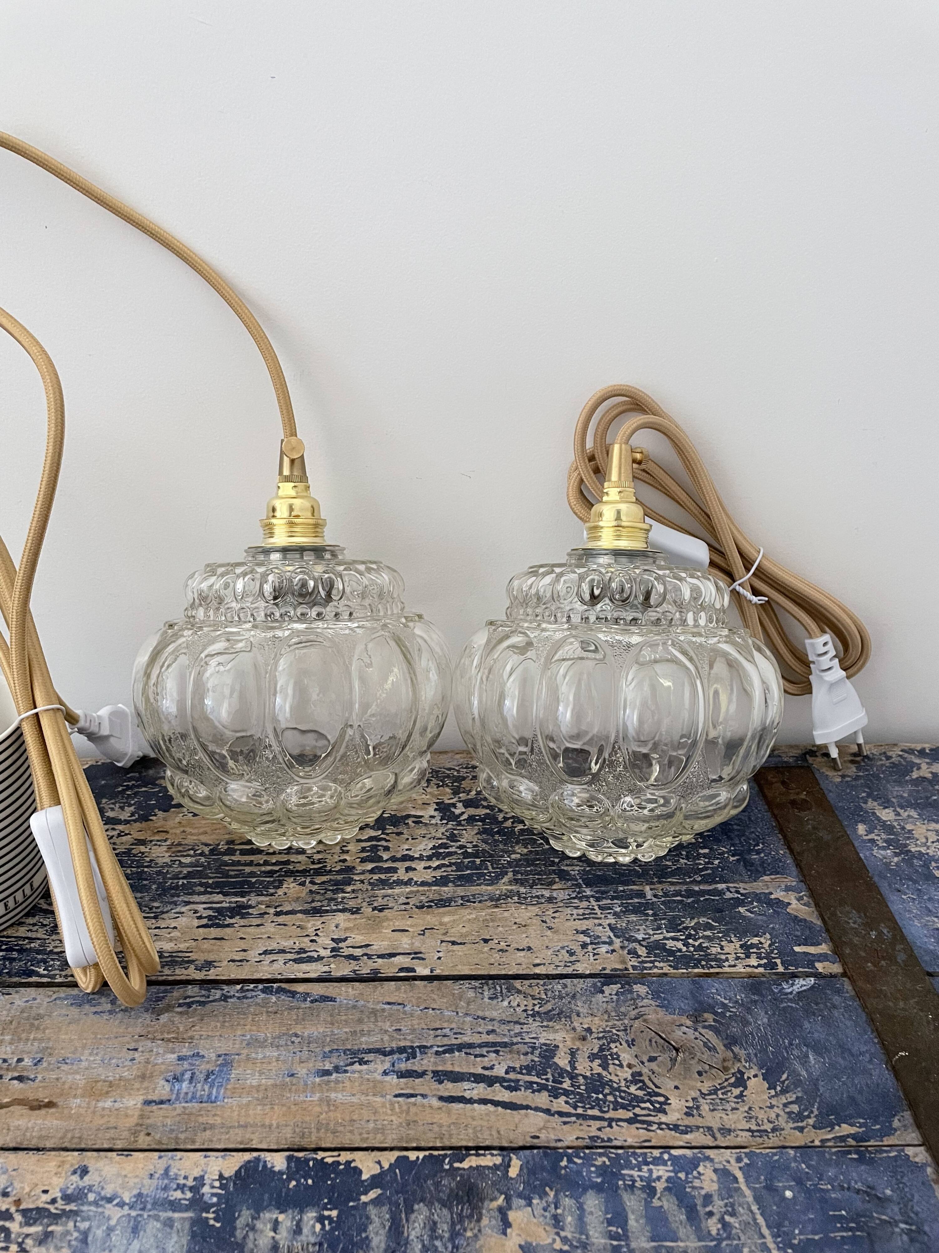 Set of two vintage globe players in chiseled glass