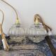 Lot de deux baladeuses vintage globes en verre ciselé