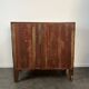 English commode from the George III Regency period, bombe shape in mahogany veneer.