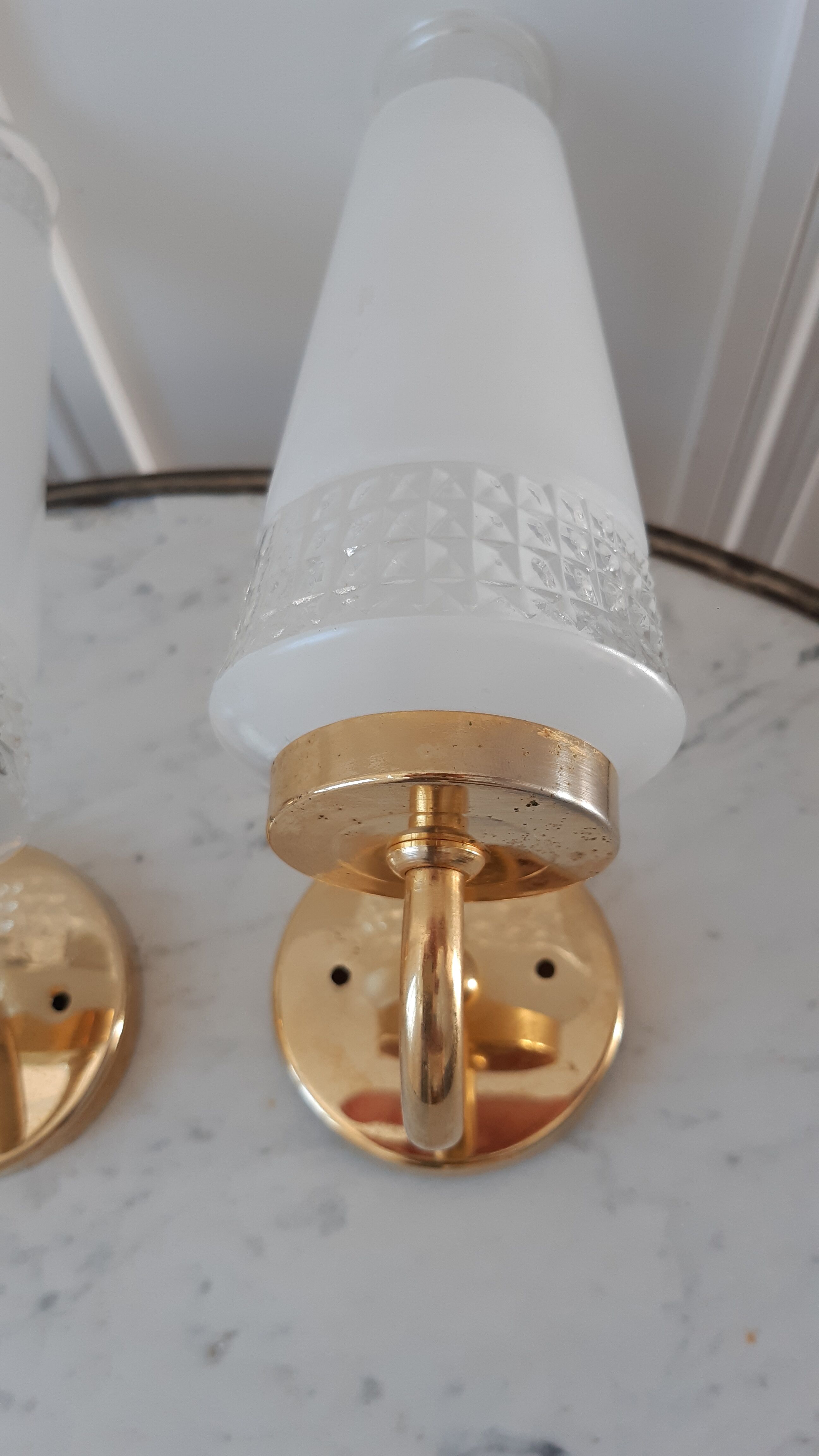 Pair of glass and gilded metal sconces 50s