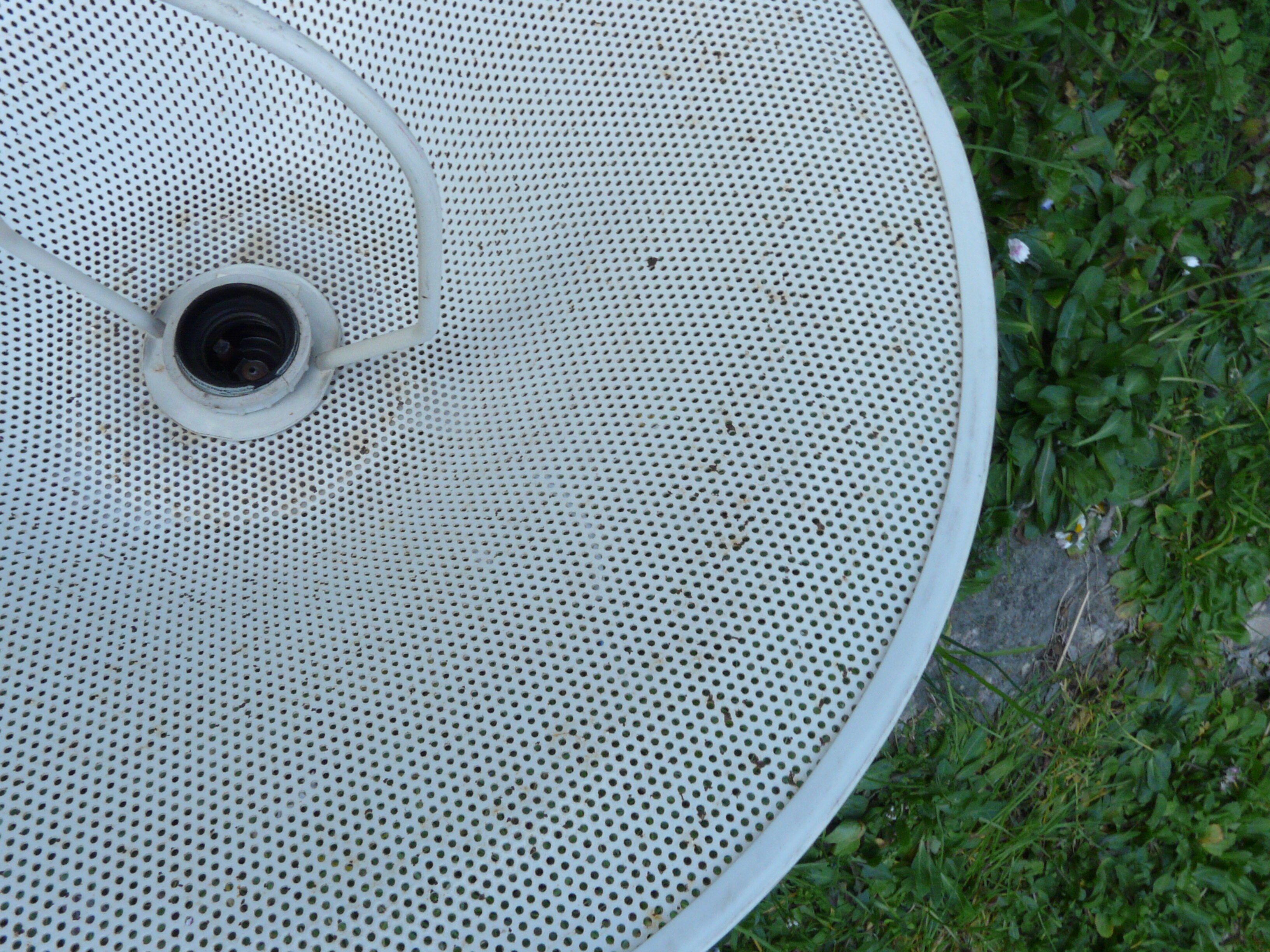 White perforated sheet metal chandelier