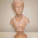 Old bust of a child in platre