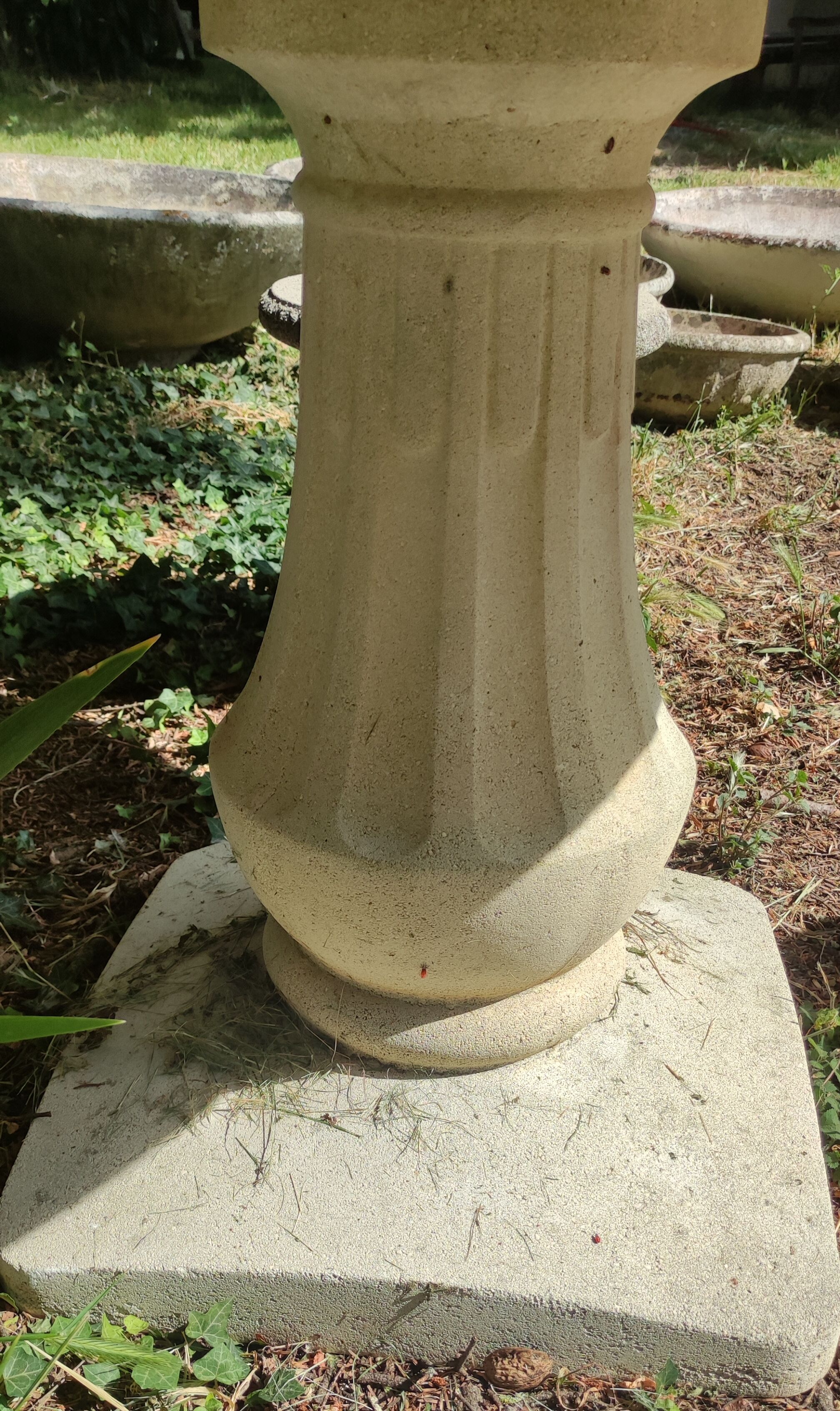 Old garden furniture in reconstituted stone