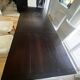 Solid cherry wood dining table, extendable for 8 to 12 people.