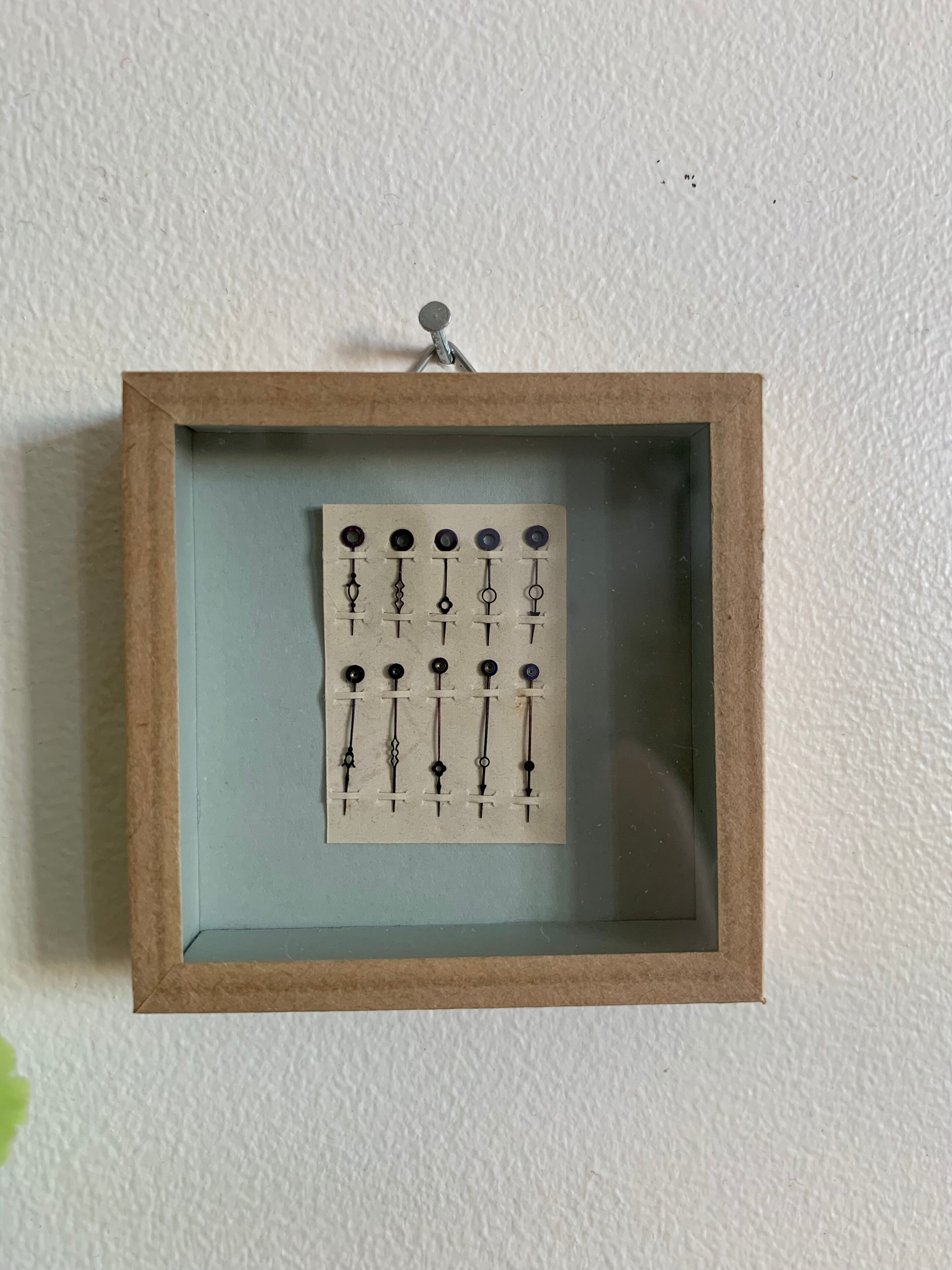 Miniature frame, antique pocket watch hands