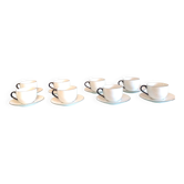 Set of eight white porcelain cups with blue edging / vintage 70s-80s