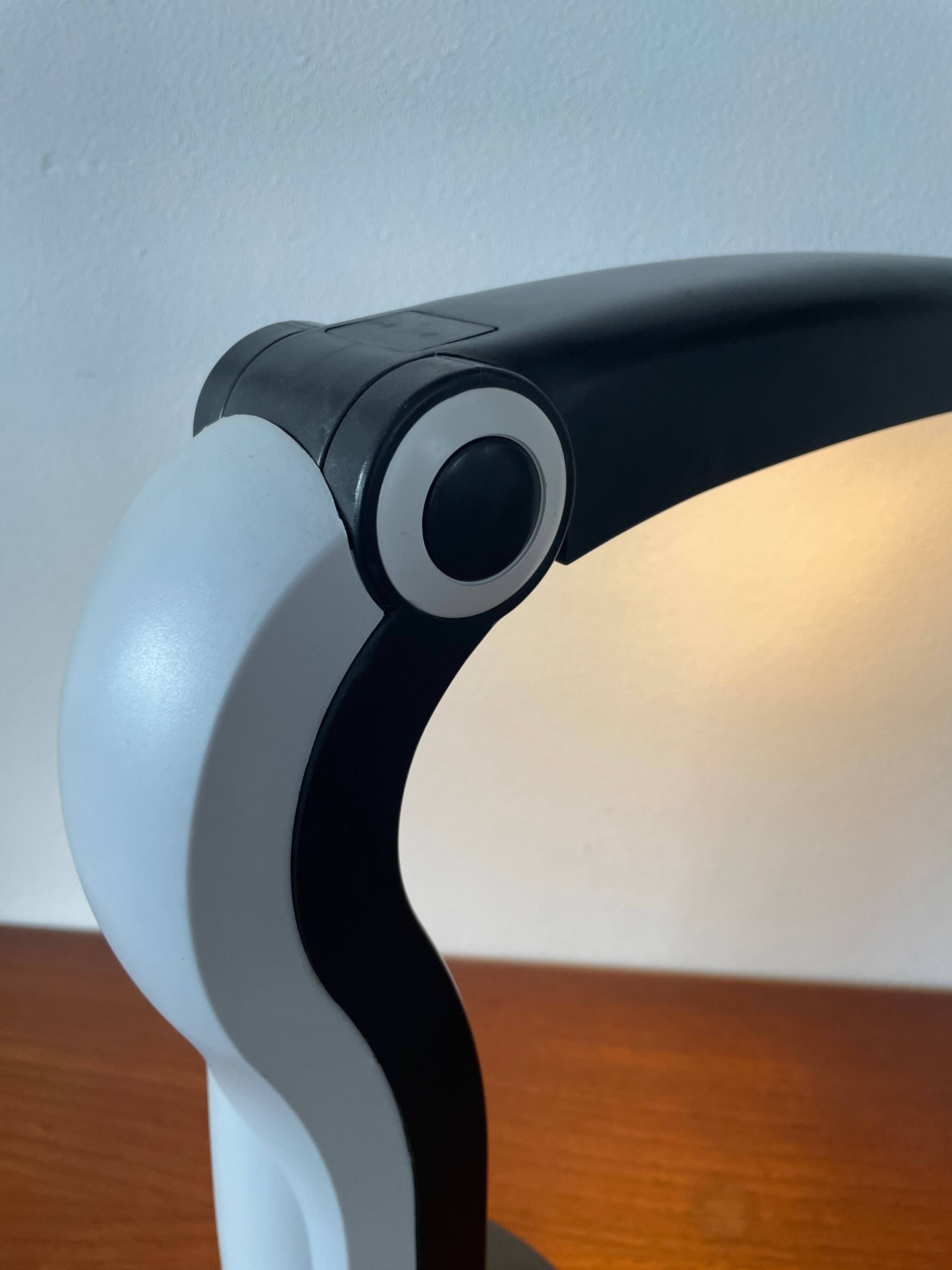 Luminaire Toucan en noir et blanc HT Huang Design