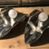 Pair space Age chrome metal wall appliques