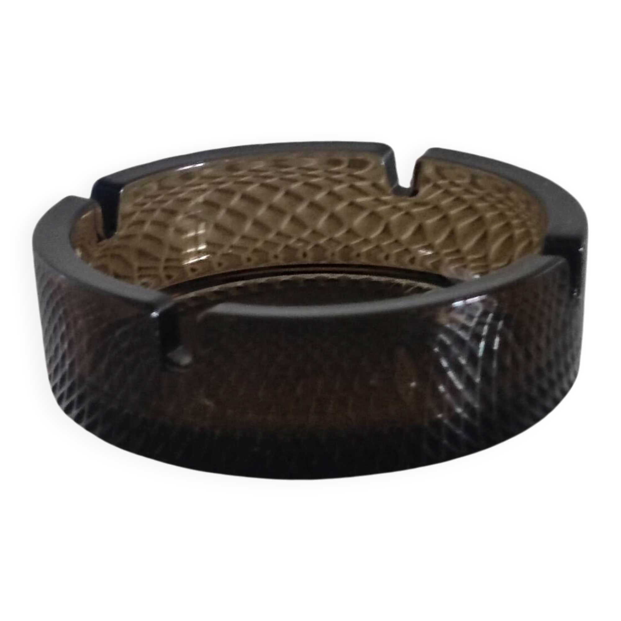 Dark smoked glass ashtray from the 1970s.