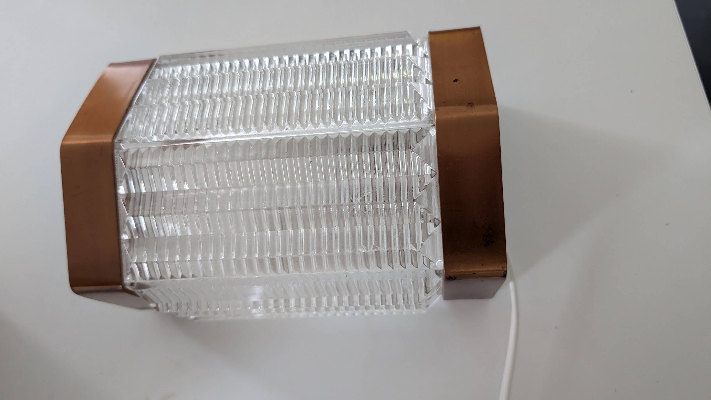 Scandinavian wall lights in copper and pressed glass