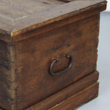 Rustic and weathered antique oak chest from the 18th century.