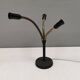 Old cast iron table lamp with brass bend and 3 light sources