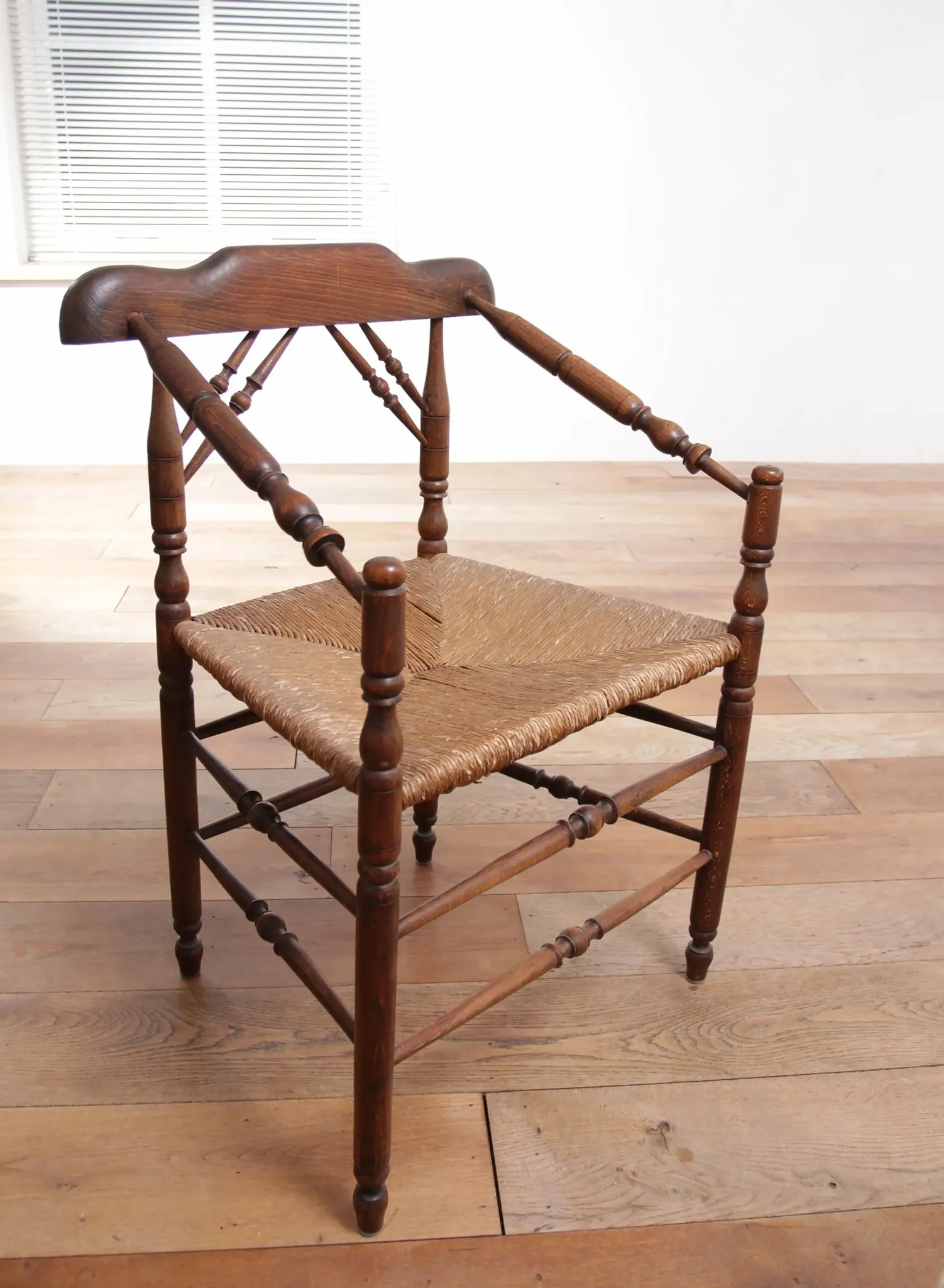 Rare antique Dutch oak armchair with rush seat