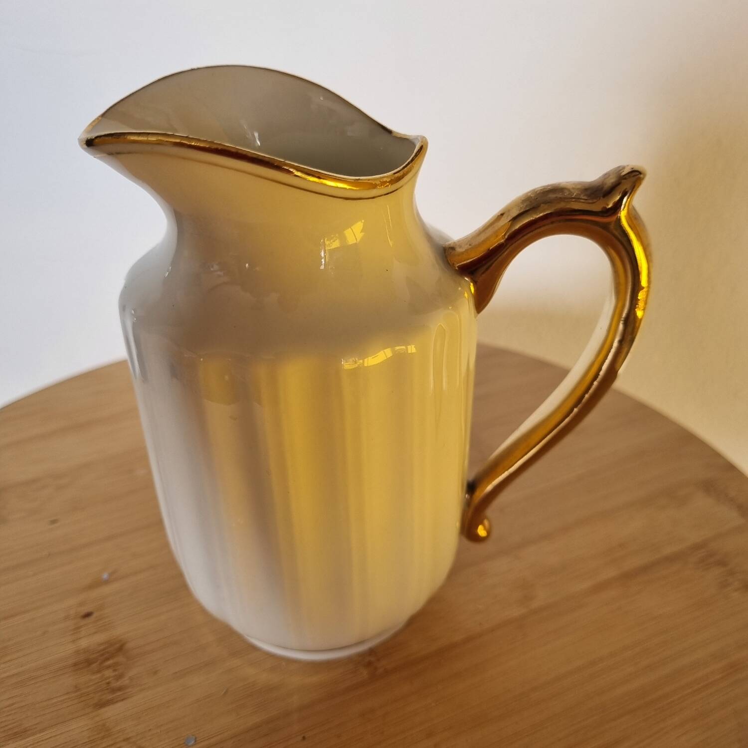 White and gold porcelain milk jug