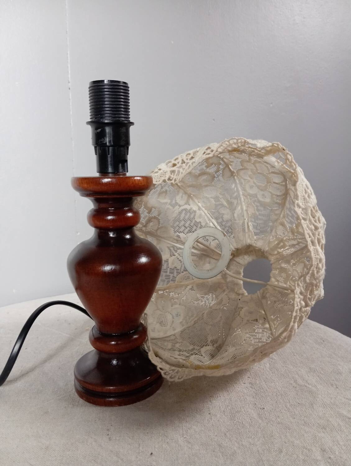 Table lamp with romantic wood and lace ambiance, retro chic