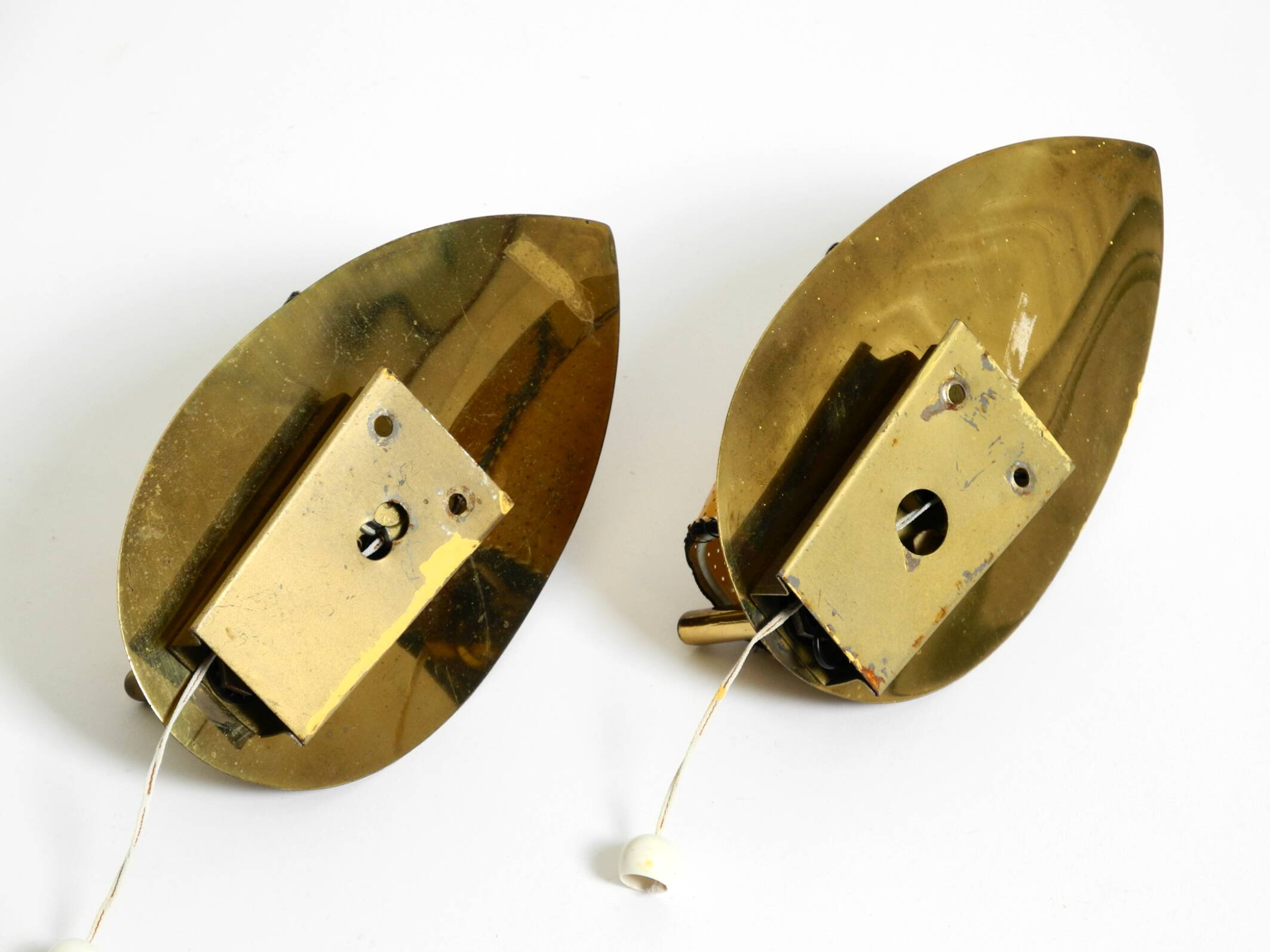 Two enchanting original Mid Century Modern brass wall lamps