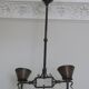 Brutalist wrought iron and copper 2-arm chandelier, 1960s
