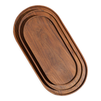 Trio of oval teak trays or cups