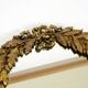 Beautiful small French mid-century wall mirror with an ornate brass frame