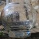Vintage blown glass pitcher with bubbles, transparent.
