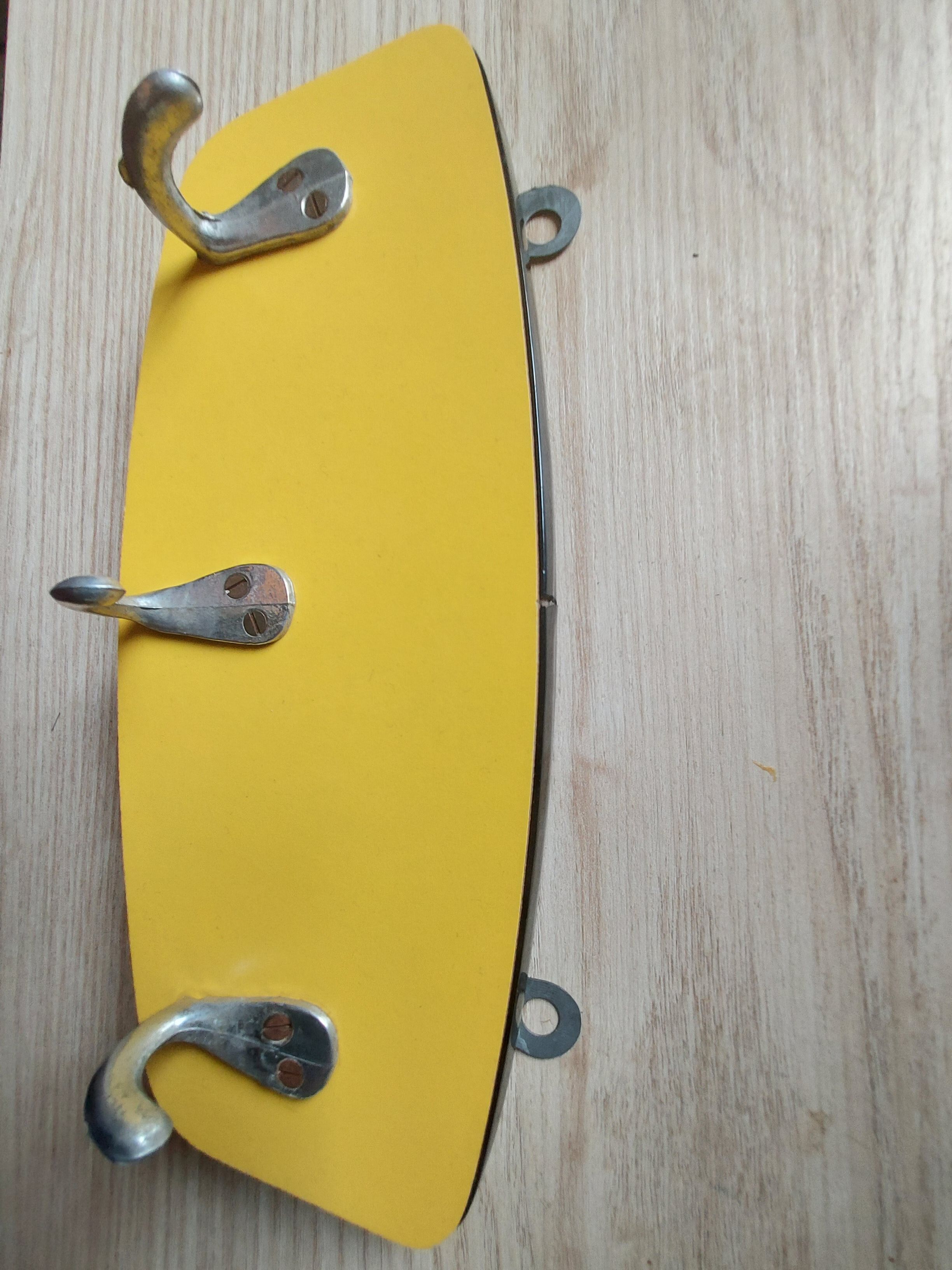 Yellow formica tea towel holder