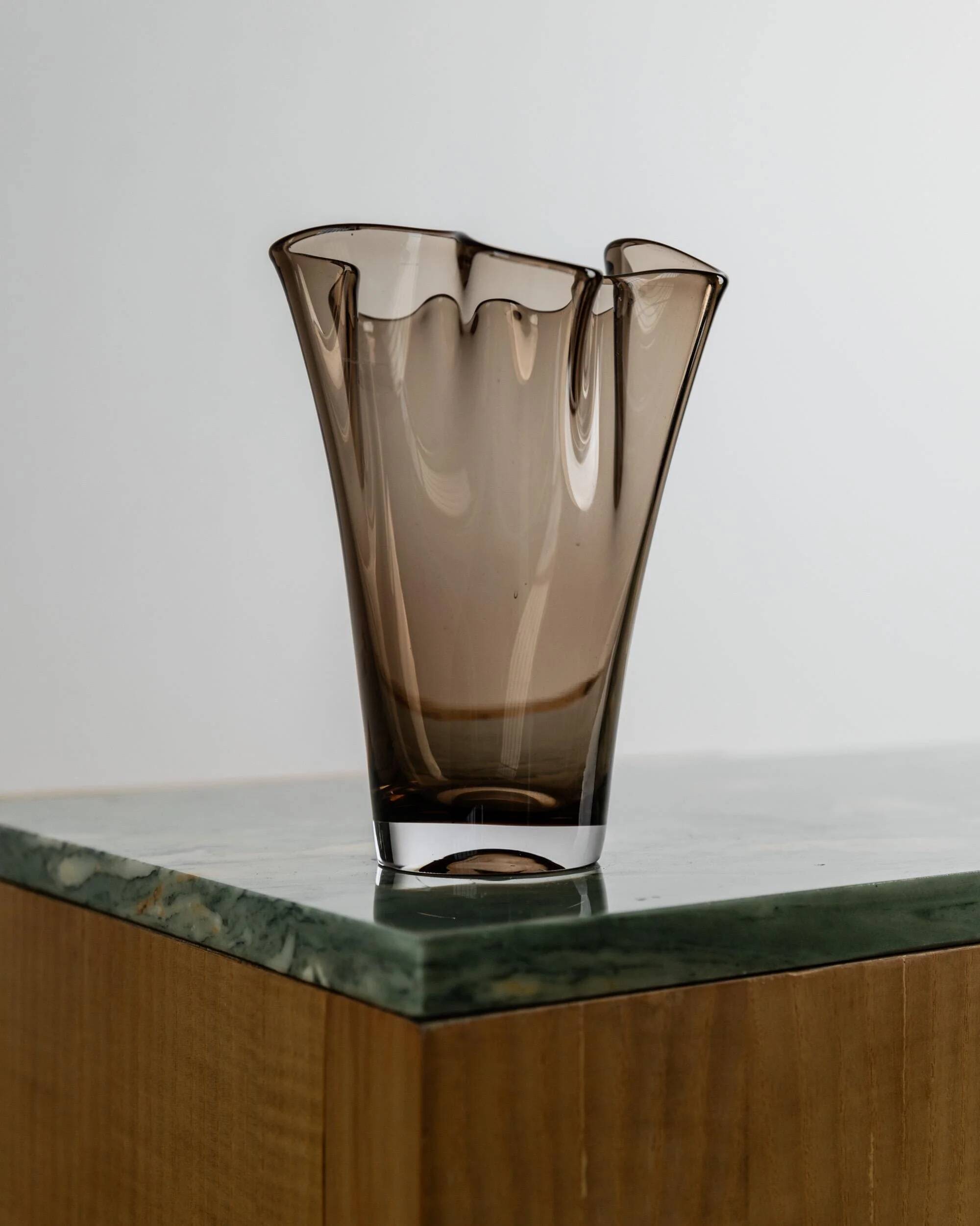 Vintage Murano glass vase from the 1980s, smoky brown, organically wavy shape.