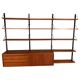 Modular wall shelf in teak in mid-century modern style, designed by Poul Cadovius for Cado, 1960.
