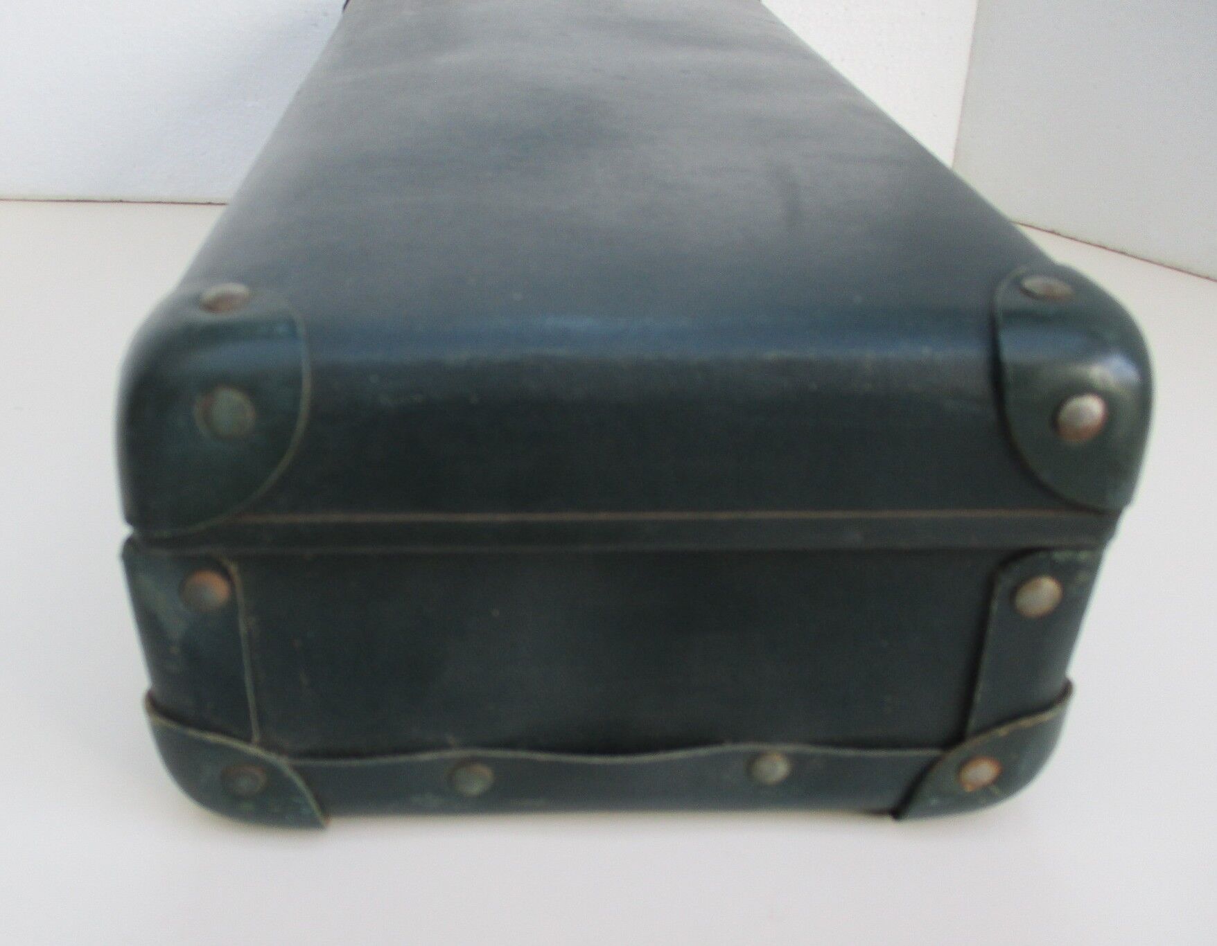 Vintage green cardboard suitcase