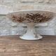 Flat serving compote dish in Terre de Fer HB & Cie with brown floral decoration.