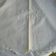 Ancient cotton sheet embroidered with flowers and initials