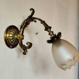 Bronze wall light with opaque glass tulip